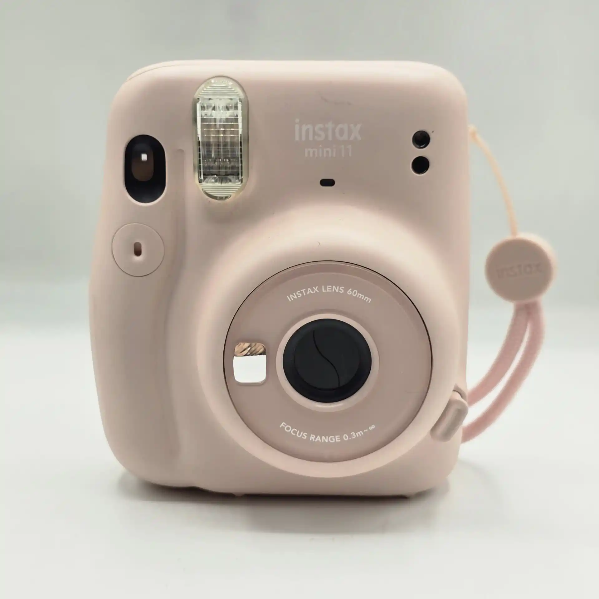 دوربین چاپ فوری Instax Mini 11 دست دو